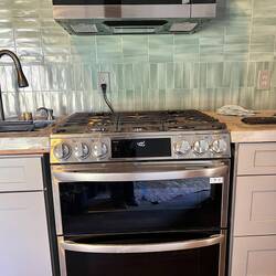 LG gas range and microwave with range hood