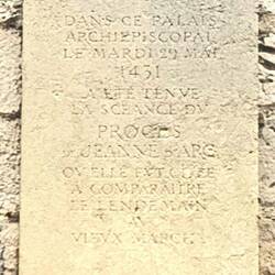 This plaque located at the Archbisho's Palace commemorates the trial of Joan of Arc, May 29. 1431