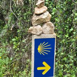 A cairns built on top of a way marker