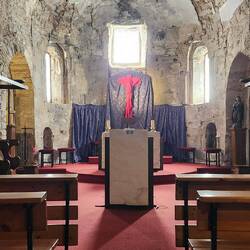 My favorite church, no gold or silver anywhere. Just a red cloth in the shape of a cross, Rabanal.