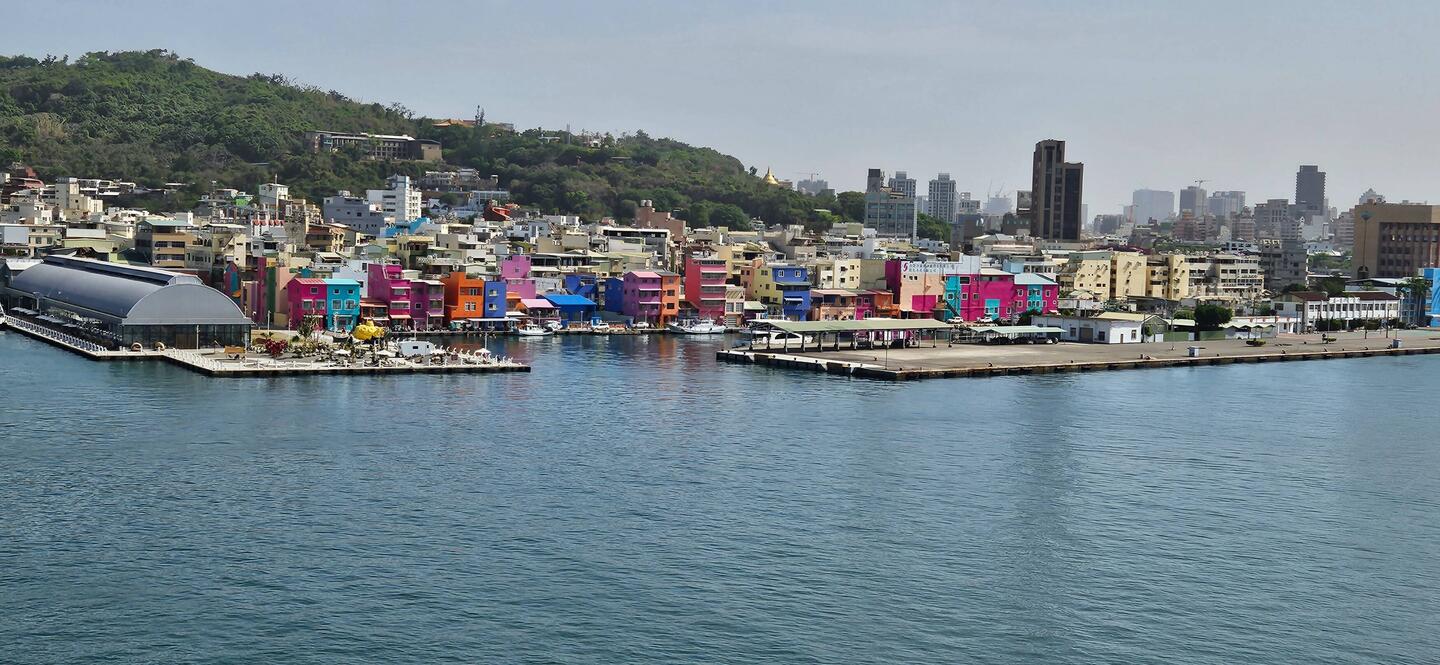 Some colorful buildings lining the entry to the harbor.