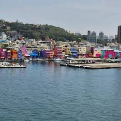 Some colorful buildings lining the entry to the harbor.