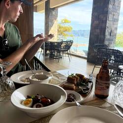 Chris showing our view from dinner