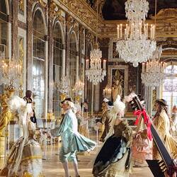 Hall of Mirrors; dancers in period costumes