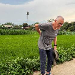 Alain après la corvée de repiquage du riz.