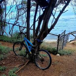 A seaside seat above a seaside ride.