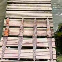 Crossing the River Gunnel via the footbridge