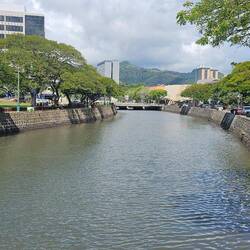Just outside Chinatown, there are loads of homeless living on both sides of the river.