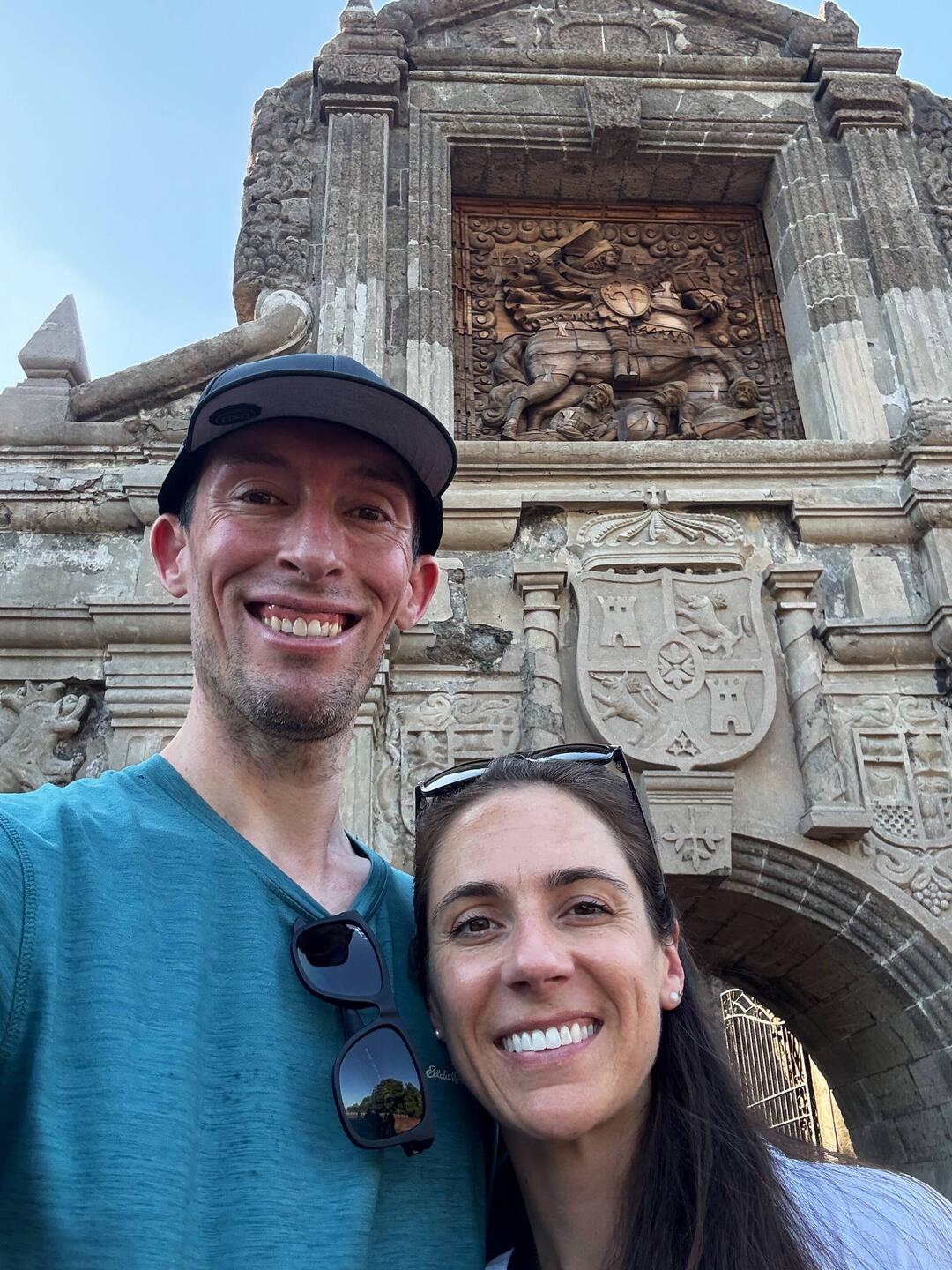 Us in front of the Fort Santiago entry way