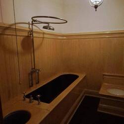 Modern toilet & shower of the time.