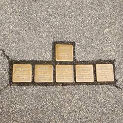 Stolpersteine, "Stumbling Stones" embedded in pavements, serving as memorials to victims of Nazis