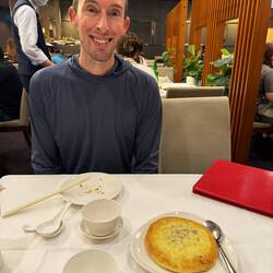 Chris looking exhausted after a long travel day