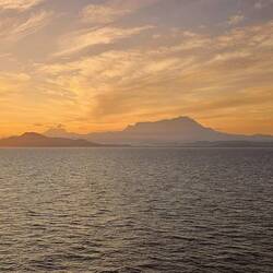 Sunrise behind Mount Kinabalu.