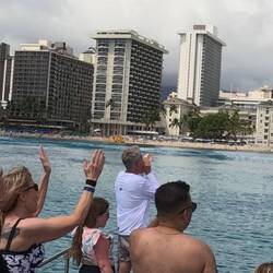 Victor helped blow the shell to clear surfers on our return to the beach