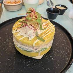 Causa, a mix of two famous Peruan foods, potato and fish (ceviche style)