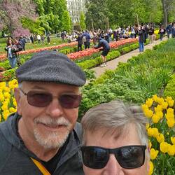 Selfie with tulips behind