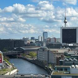Looking East, with the Friedrichstraße railway station (centre left) across the River Spree