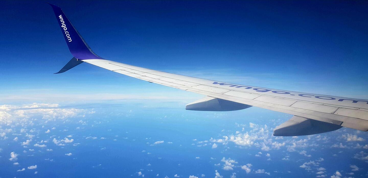 Flying over a calm Caribbean sea.