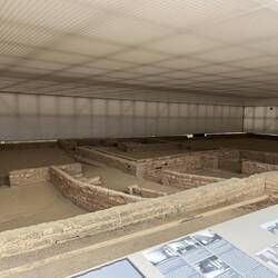 Neck-shot room in centre rear