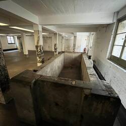 Potato washing trough below kitchen block
