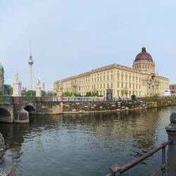 The reconstructed Berliner Schloss (right) across the road from the cathedral (left)