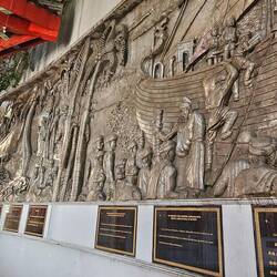 A huge bas relief mural lined the back of one of the temples.