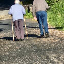 A happy couple taking a morning stroll