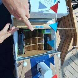 The upper deck could be folded back to reveal a lower deck/beverage hold!