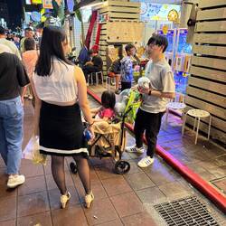 This guy had two pet geese at the night market. Can you spot the second?!