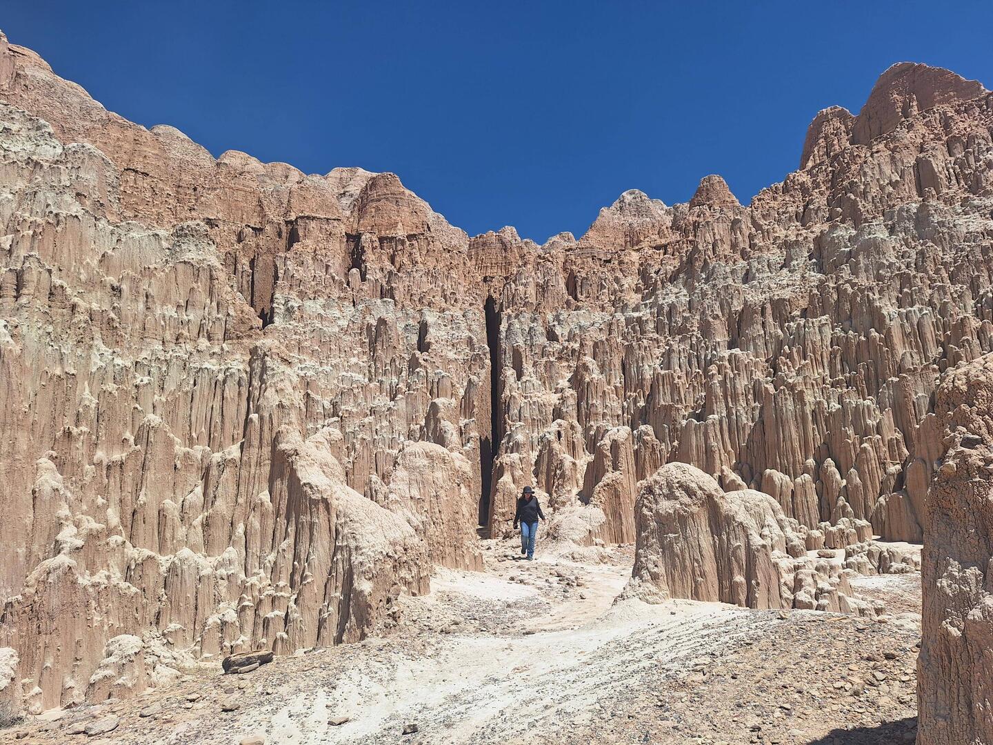 Sandy emerging from one of the better slot canyons