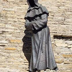 One of the three bronze monk statues located in the Danish King's Garden