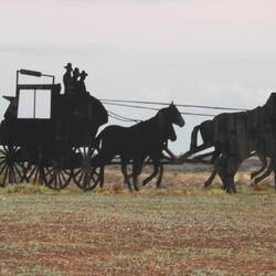 Stagecoach at town sign on Northern end