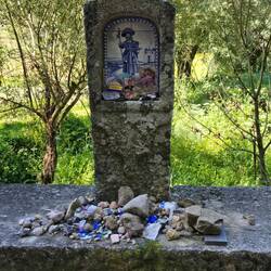 A small memorial to Santiago. People leave stones and stuff