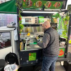 Look at how small this food truck is!! We had lunch here. Recommended by one of the vendors