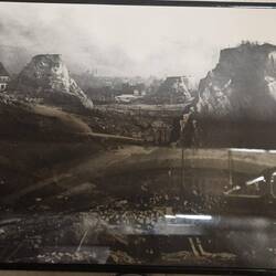 Picture of how much of the hill was removed to raise the streets