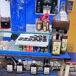 Ginjinha (a liqueur) sour cherries infused in alcohol & sugar. It's drunk from a chocolate cup.