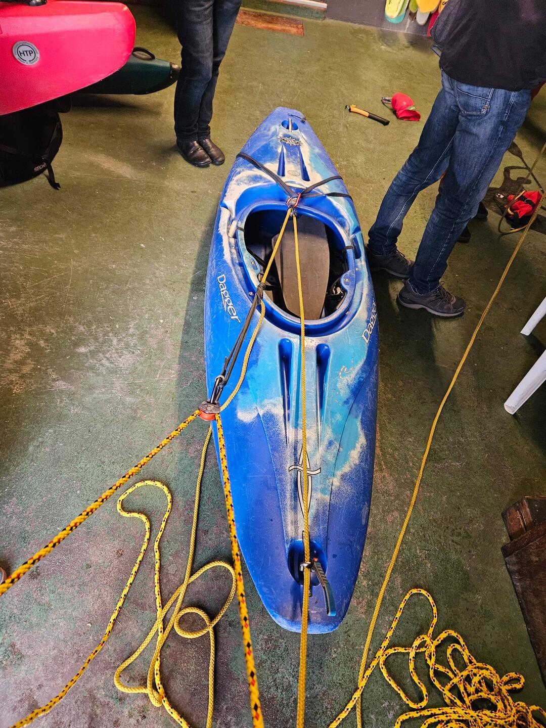 Rescuing a kayak using rope slings and double pulley