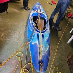 Rescuing a kayak using rope slings and double pulley