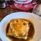 Francesinha (Porto's famous sandwich: beef, ham, sausage, cheese, fried egg, tomato sauce.