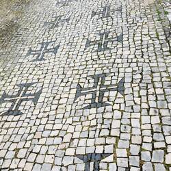 Even the city sidewalks have a templar sign