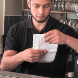 Busy, busy, efficient and friendly waiter took care of all the tables