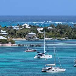 Ballyhoo anchored by Anna's Cay outside HopeT own Harbor, from Elbow Reef Lighthouse Lighthouse