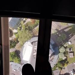 Rotating floor. You can walk across the clear floor; I chose to stand on the beam.