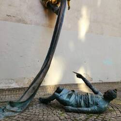 Carl Lutz Memorial: Angel sending down a bolt of cloth to a prostrate victim. He saved many Jews