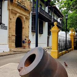 A medieval mortar in front of the Palace of the Inquisition.