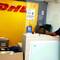 DHL office: a 23 kg box (the one on the scale) has been "repatriated".