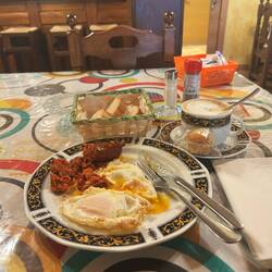 Chorizo, eggs, bread, coffee con Leche for my second breakfast