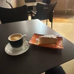 First breakfast - coffee and "Santiago cake" at my albergue bar