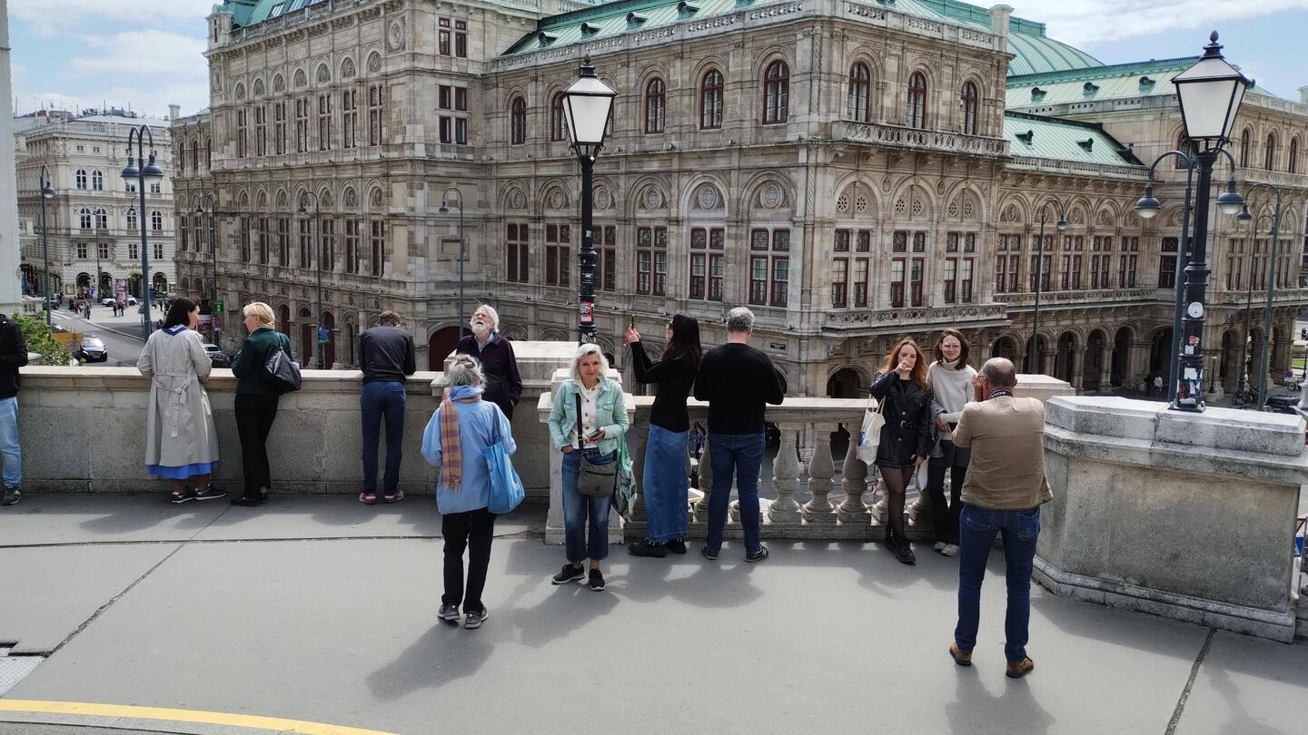 Lounging at the balustrade of the Albertina museum