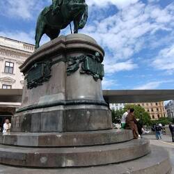 Lounging under the statue of Archduke Albrecht at the Albertina